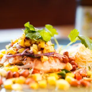 Ko-Rat SappVerr !
Grilled Salmon Fillet with fresh diced mango / lime Chille Dressing
toasted peanut.