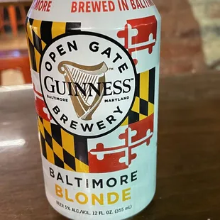 a can of beer on a table