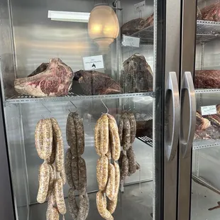 a display case of meats