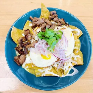 Chilaquiles add carne asada