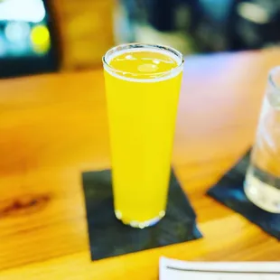 The mango peach cider felt nice on the tongue and was fruity.