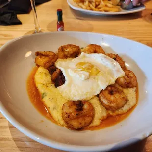 I swore next time I'd come get shrimp and grits.Jalapeños chopped into the grits. Got Dang delicious!!