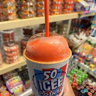 Strawberry Icee with lihing mui powder and juice.