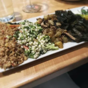 Seasonal veggie plate at Seed: Farro, broccoli and couscous, roasted potatoes and mushrooms, braised collards, blistered shishito peppers