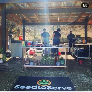 a group of people preparing food
