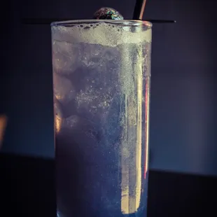 a drink in a tall glass