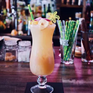 a glass of cocktail