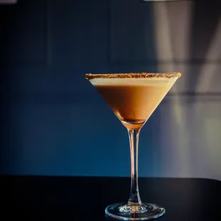 a cocktail in a martini glass
