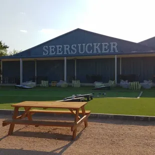 picnic table in front of building