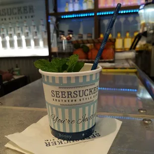 Refreshing Seersucker Southside Rickey with a glimpse of their beautiful bar in the background.
