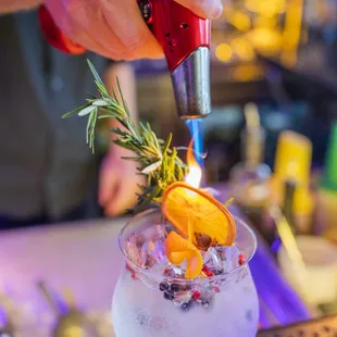 a bartender preparing a cocktail