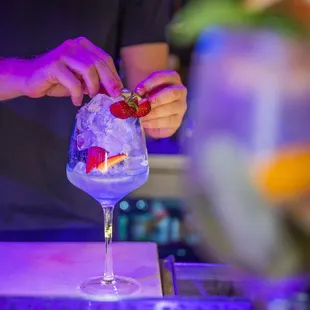 a bartender making a drink