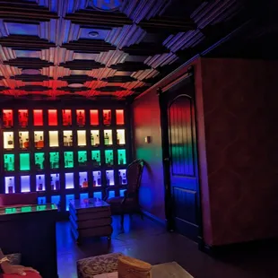 a brightly lit room with stained glass windows