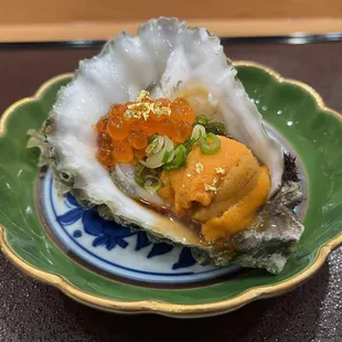 Oyster topped with ikura and uni, with dashi soy sauce