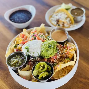 Nachos Grandes( black beans on the side) and a Birria taco