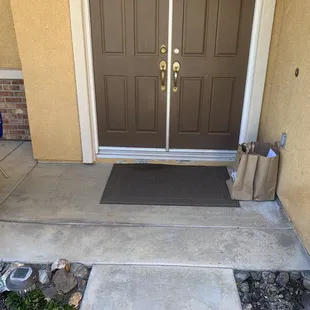 Meals in a paper bag, ice chest with cooling packs about 6 feel away on a chair not the floor.
