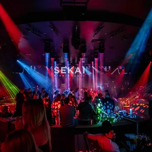 a crowd of people at a party