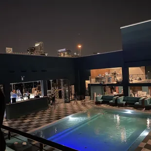 a pool and lounges