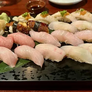 fabulous sushi specials on the blackboard.  Here includes, flounder fin-side, fatty tuna, striped jack , parrot fish   Large scale blackfish