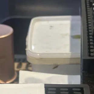 a close up of a coffee cup on a table