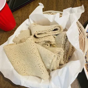 a basket of pita bread