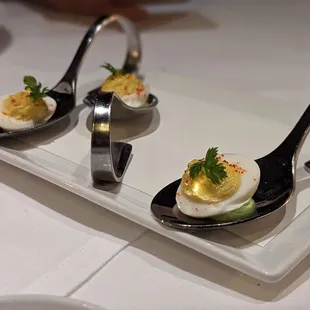 Deviled quail egg amuse bouche