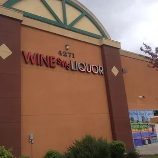 the front of a wine and liquor store