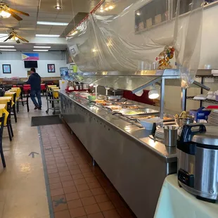 a view of a restaurant with a buffet