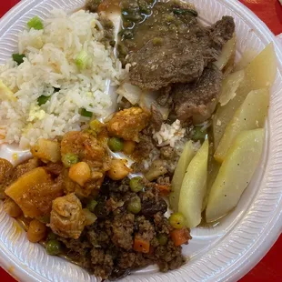 a plate of food on a red table