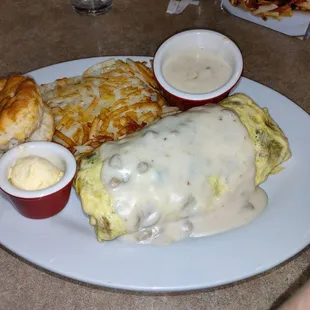Sunrise omelette comes with the basics inside and country gravy on top