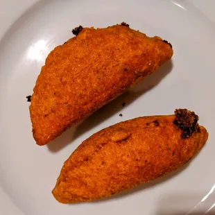 Pastelitos Crispy empanadas that are stuffed with ground beef, diced potatoes, onions and carrots. Vegetarian and vegan options available!