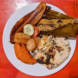 Fiesta Plate A little bit of everything! This plate comes with 1 regular sized pupusa, 1 tamale, 2 pastelitos and a side of fried yuca. Ve