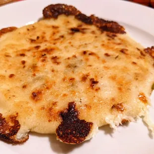 Loroco Pupusa Mozzarella cheese mix with chopped pieces of loroco, which is a Salvadorian edible flower.