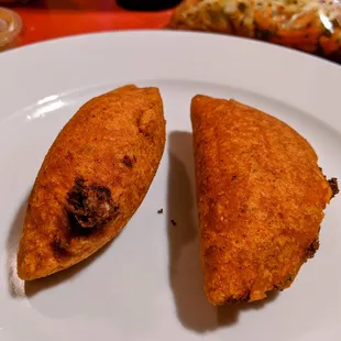 Pastelitos Crispy empanadas that are stuffed with ground beef, diced potatoes, onions and carrots. Vegetarian and vegan options available!