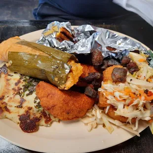 Fiesta platter. Full of flavor. Tamale is my favorite!