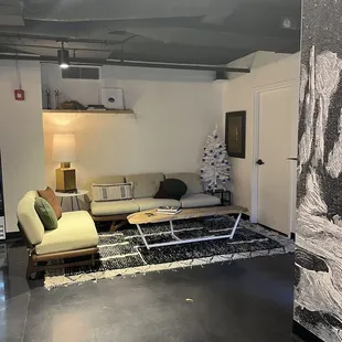 a living room with a couch and a coffee table