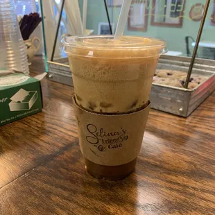 a cup of coffee on a table