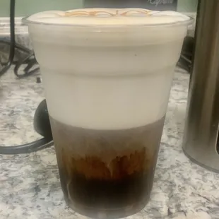 Cold foam over ice coffee