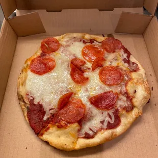 That's a small pizza for $12?!