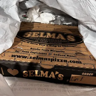 In the trash where it belonged