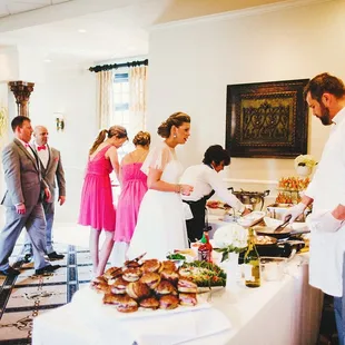 Our team helps the bride go through the buffet line!