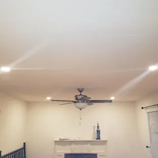 Added can lights and ceiling fan