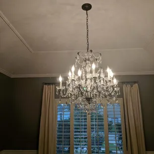 Beautiful Swarovski Crystal Chandelier installed in a bedroom