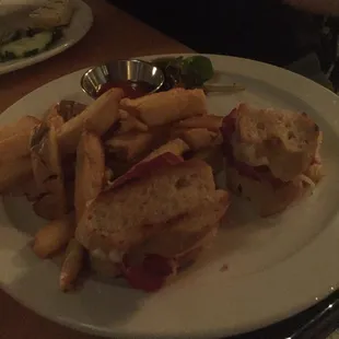 a sandwich and fries on a plate