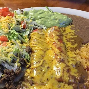 The #1 - Two cheese enchiladas and two puffy tacos