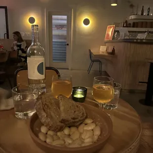 a plate of food and a glass of wine