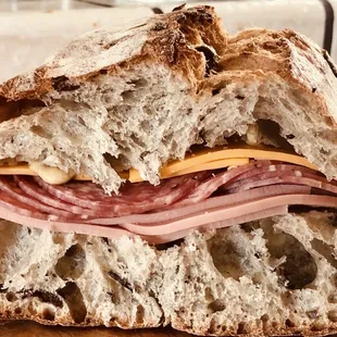 Lunch for my son using Kalamata (Green Olive) Bread. Italian meats and cheese from Genova Walnut Creek.