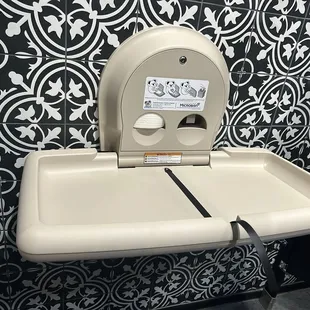 Changing table in men's room! Makes life easier for dads out alone.