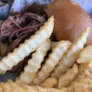 Brisket sandwich with crinkle fries