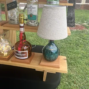 bottles of liquor and a lamp
